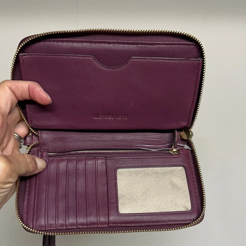 Michael Kors Plum Quilted Wristlet/ wallet